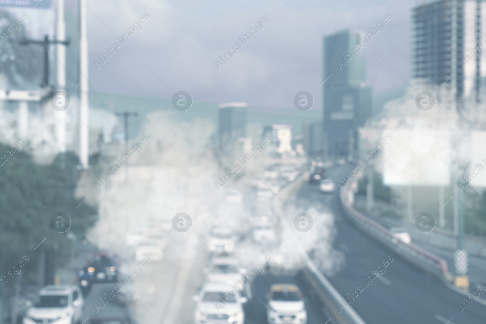 Image of Environmental pollution. Air contaminated with fumes in city. Cars surrounded by exhaust on road, blurred view