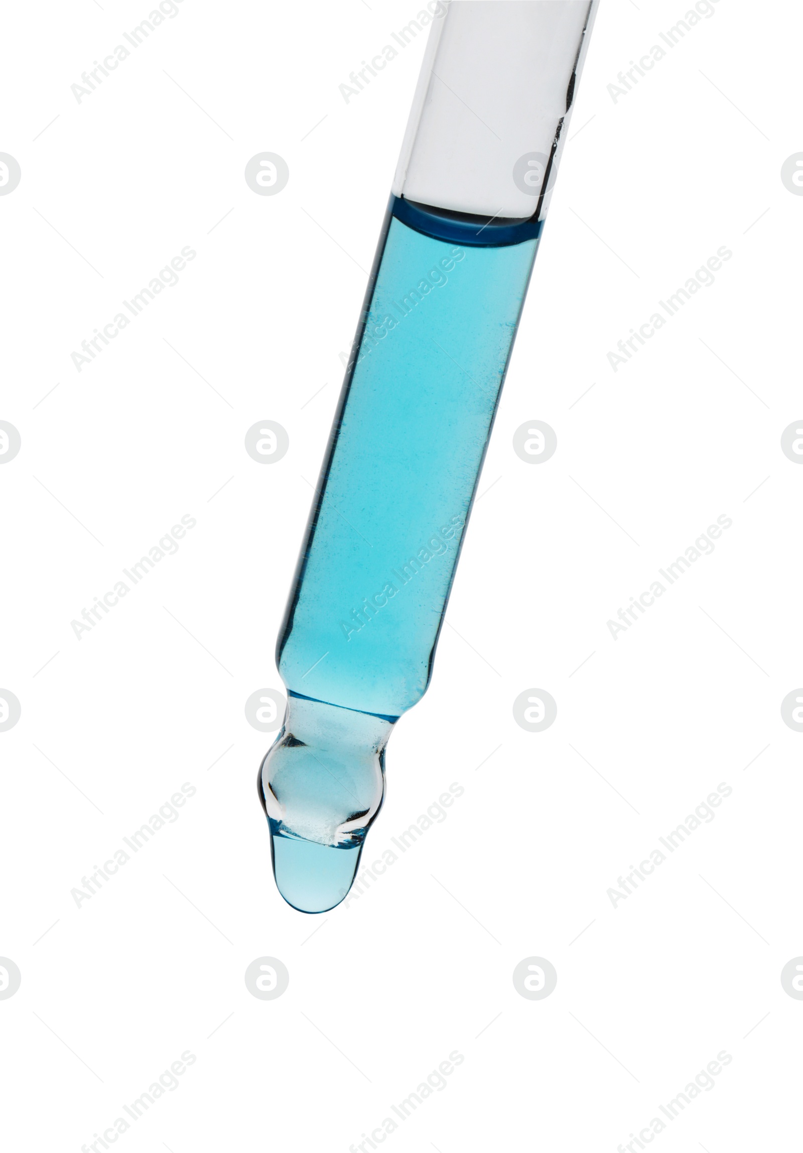 Photo of Dripping light blue facial serum from pipette on white background, closeup