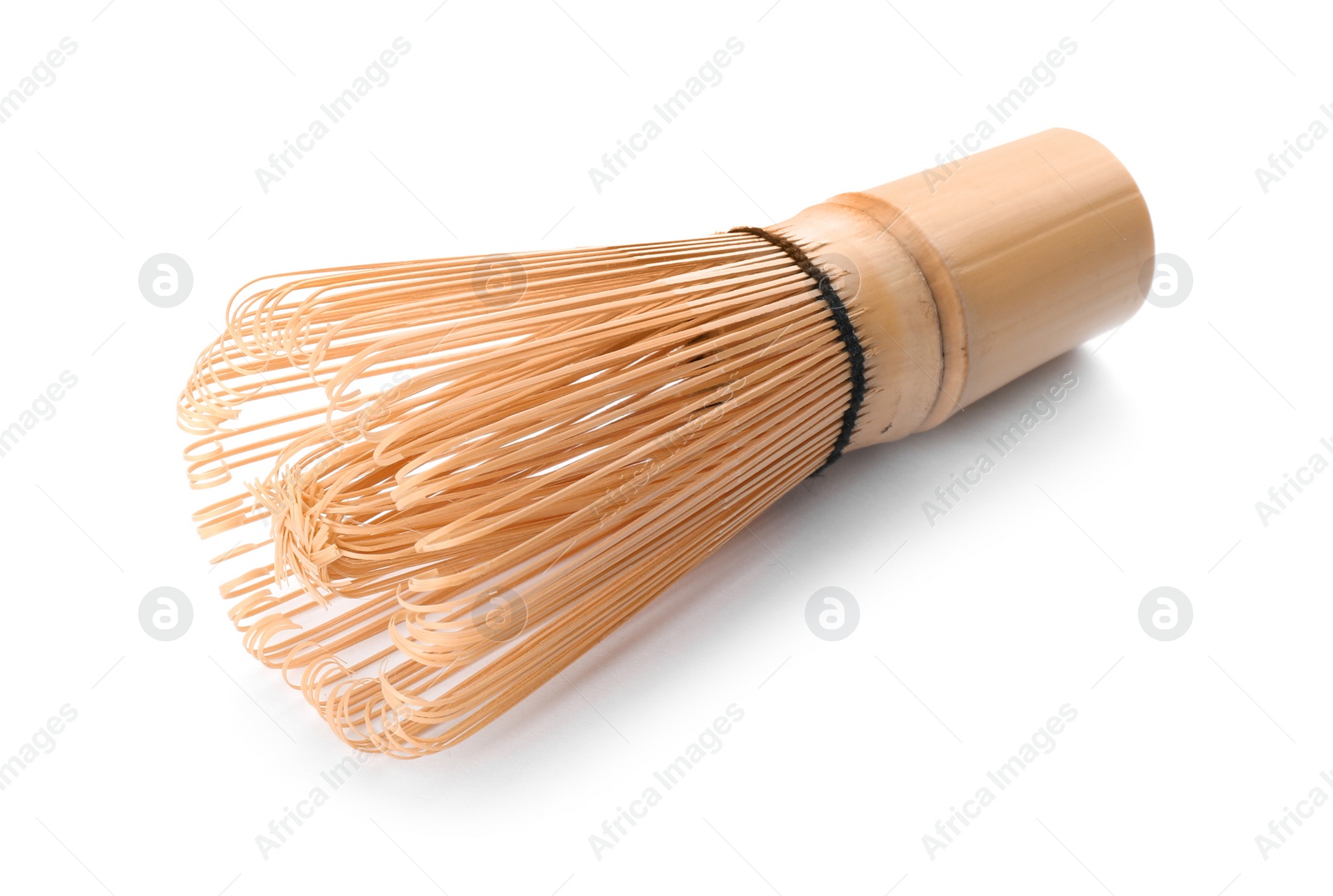 Photo of Tea whisk made of bamboo on white background