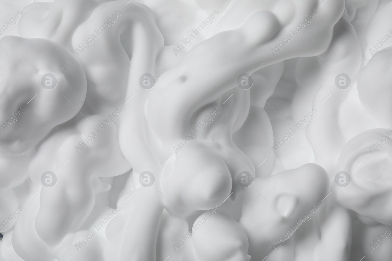 Photo of Texture of white shaving foam as background, top view