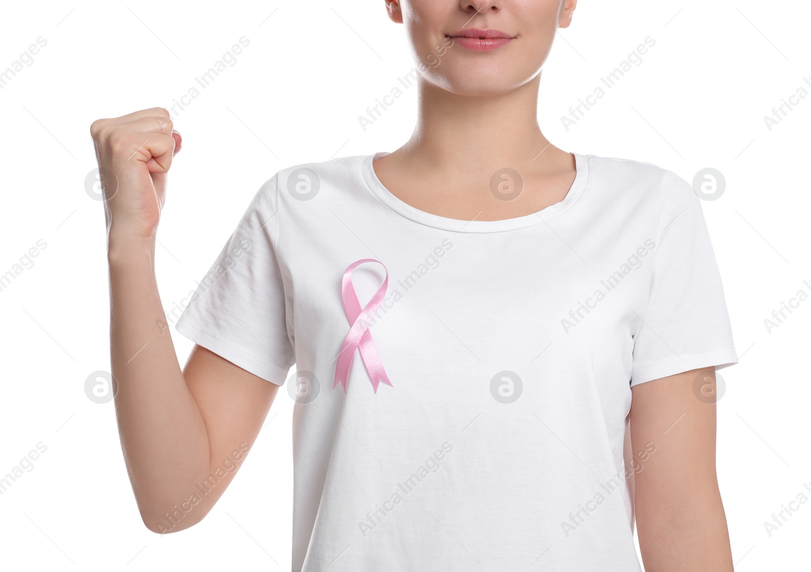 Photo of Woman with pink ribbon on white background, closeup. Breast cancer awareness