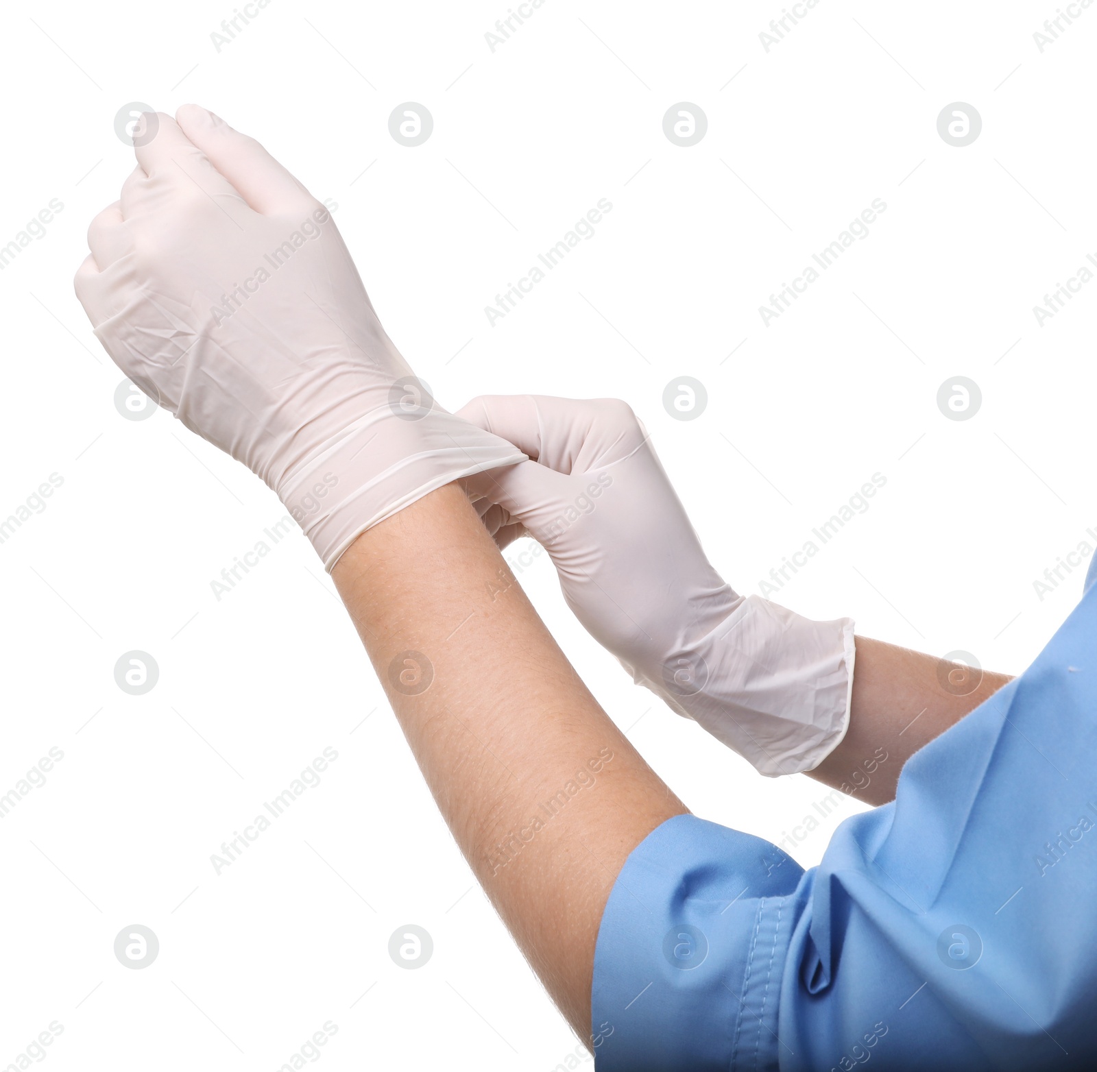 Photo of Female doctor putting on rubber gloves against white background, closeup. Medical object