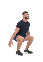 Man doing squats on white background. Morning exercise