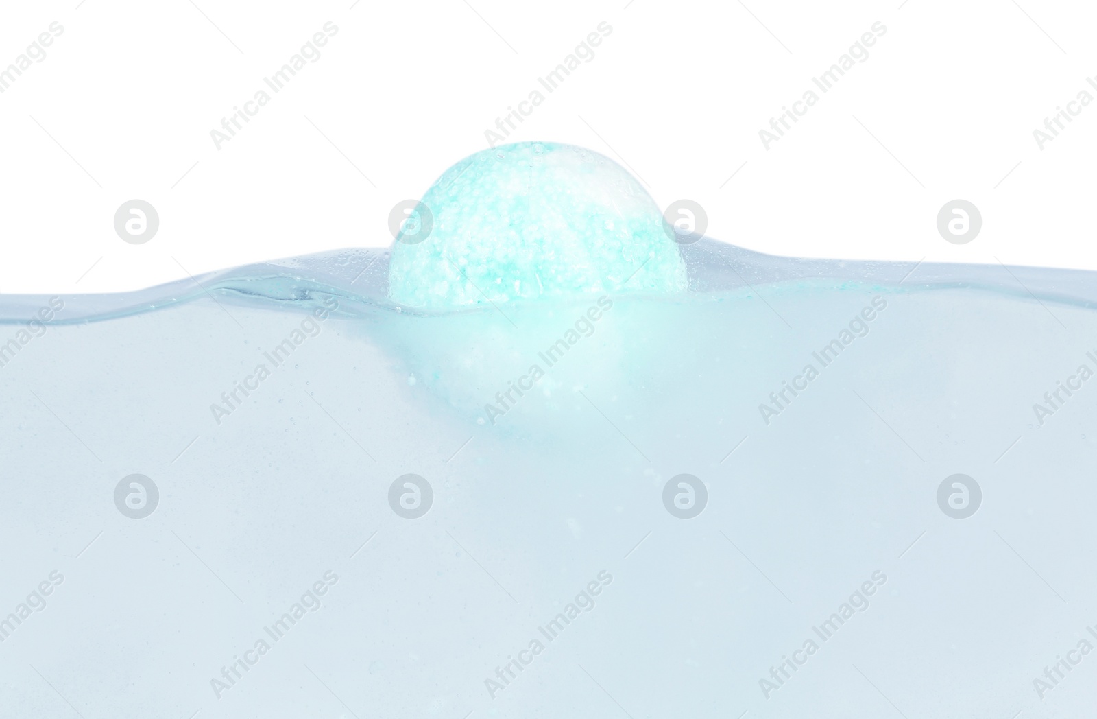 Photo of Bath bomb in water on white background