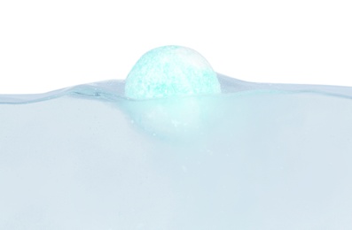 Photo of Bath bomb in water on white background