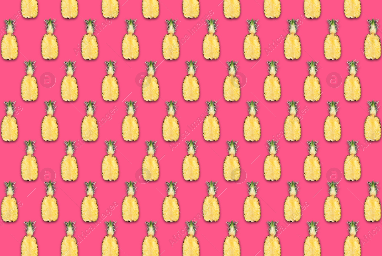 Image of Pattern of pineapple halves on bright pink background
