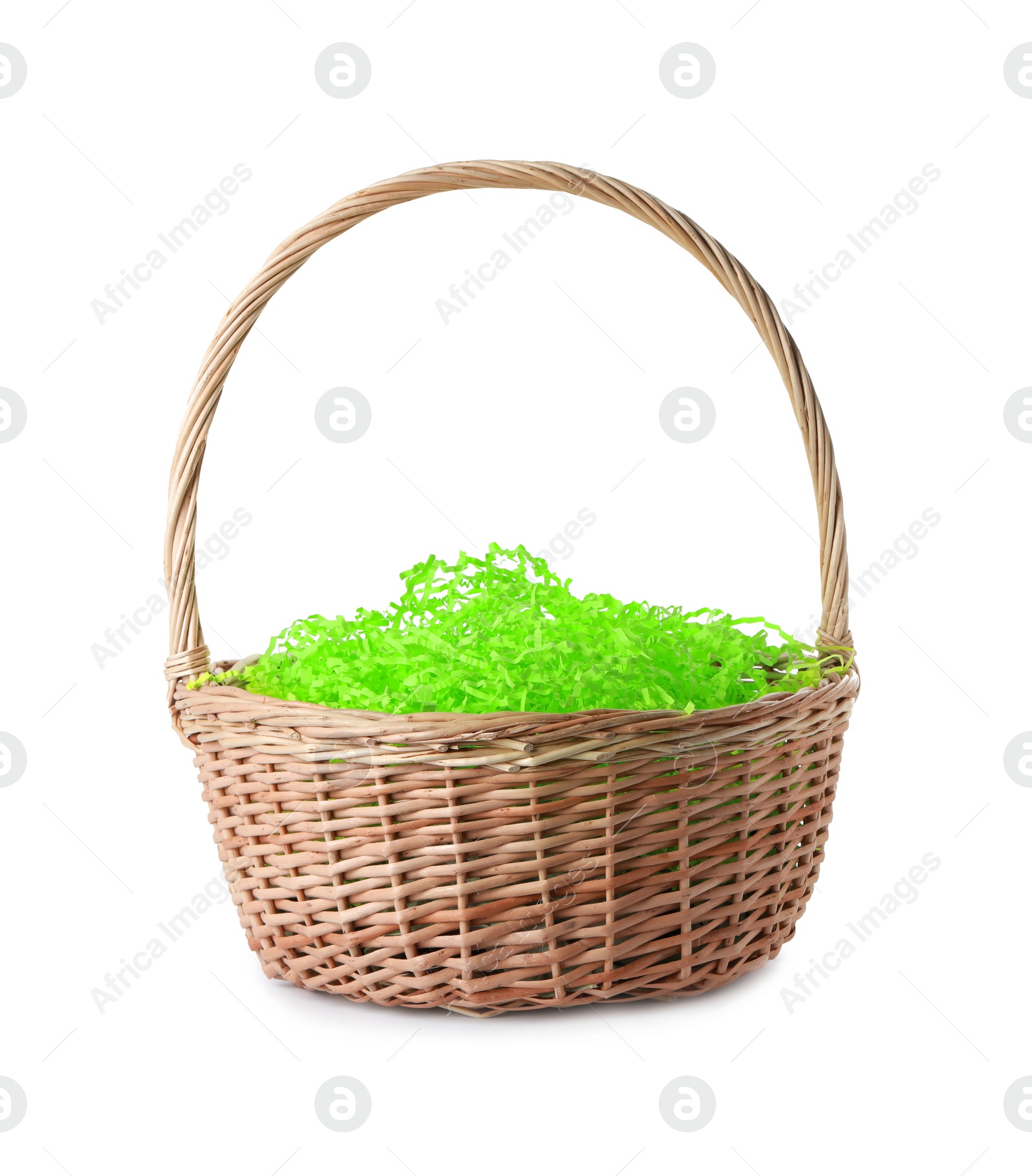 Photo of Easter wicker basket with decorated grass isolated on white