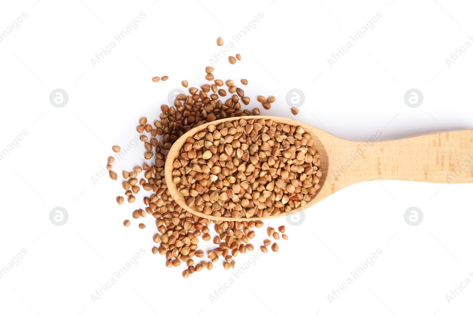 Photo of Spoon with uncooked buckwheat on white background, top view