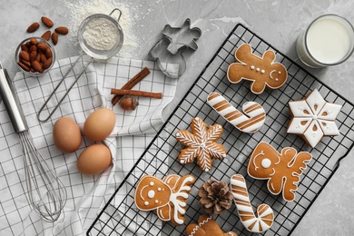 Photo of Flat lay composition with delicious homemade Christmas cookies on grey marble table