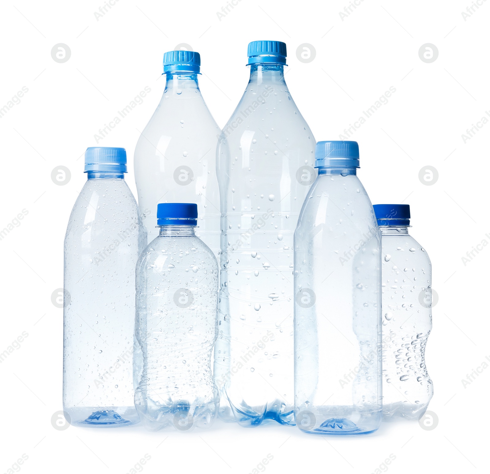 Photo of Empty plastic bottles on white background. Recycling problem