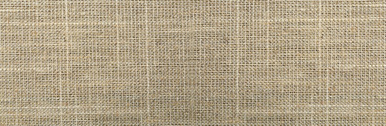 Texture of natural burlap fabric as background, top view. Banner design