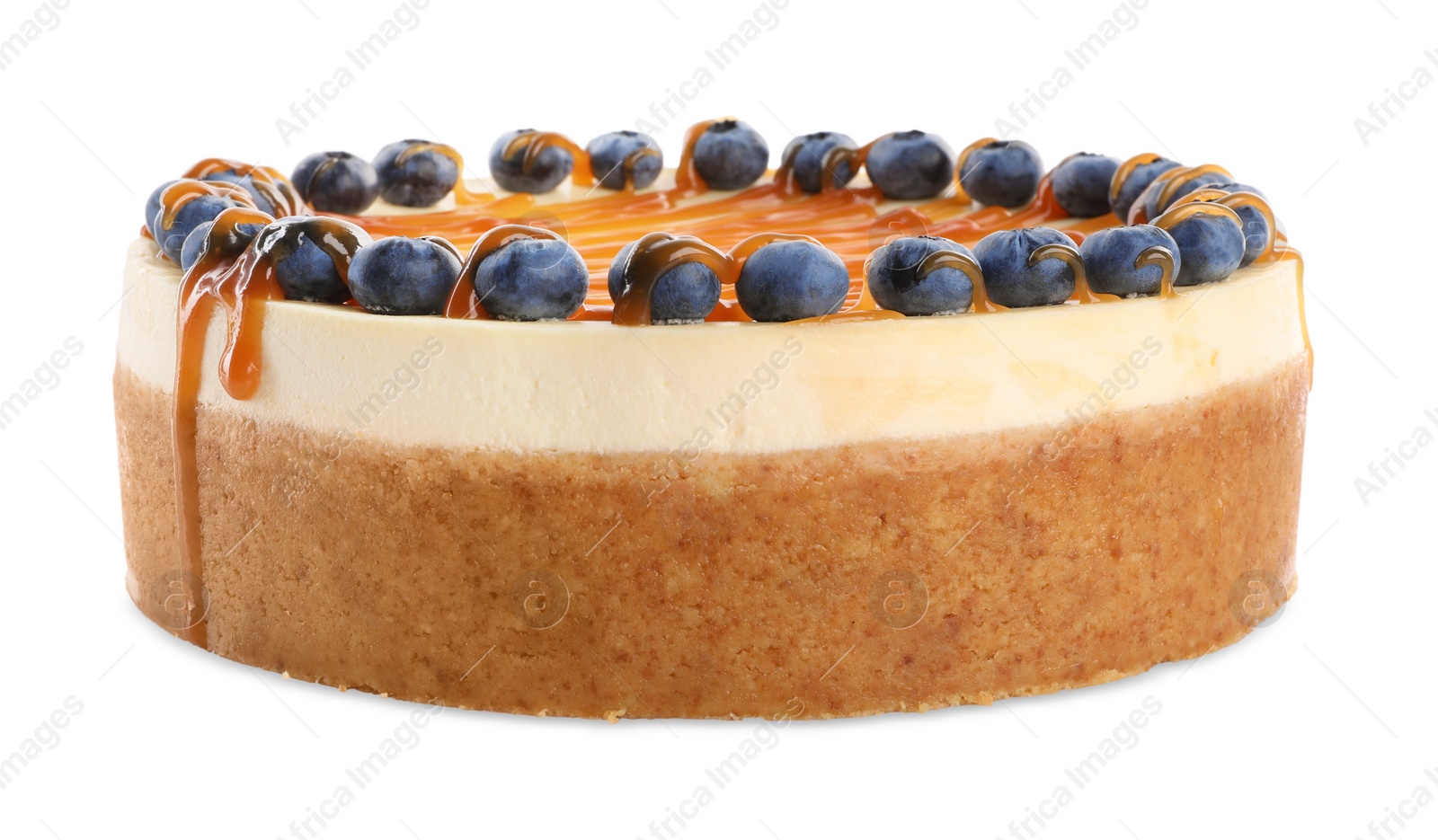 Photo of Delicious cheesecake with caramel and blueberries isolated on white