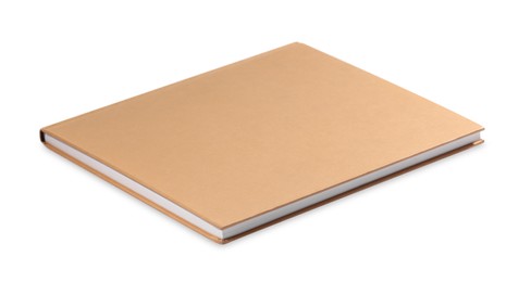 One closed beige hardcover book isolated on white