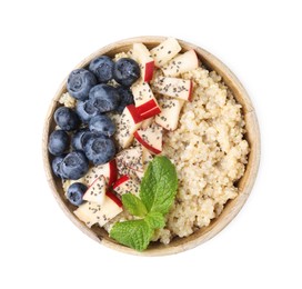 Photo of Bowl of delicious cooked quinoa with apples, blueberries and chia seeds isolated on white, top view