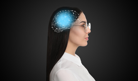 Image of Thinking concept. Young woman and illustrated brain on black background
