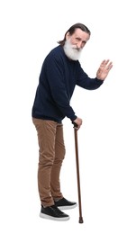 Photo of Senior man with walking cane waving on white background