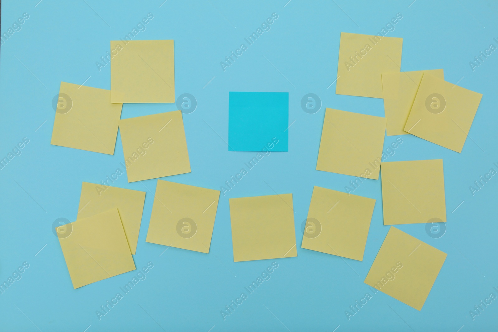 Photo of Blank colorful stickers on turquoise background, flat lay