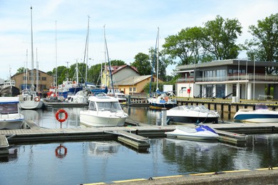 Beautiful view of city pier with modern boats