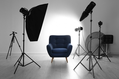 Interior of modern photo studio with professional equipment