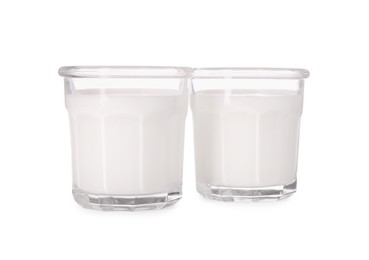 Glasses of tasty milk isolated on white