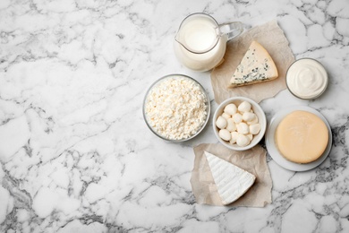 Photo of Different dairy products on light background, flat lay