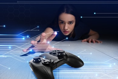 Image of Gaming disorder. Woman reaching out for gamepad on floor from darkness. Circuit board pattern