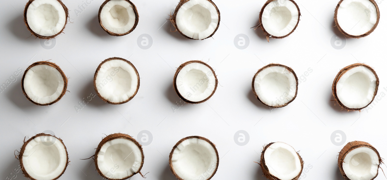 Photo of Coconut pattern on white background, top view