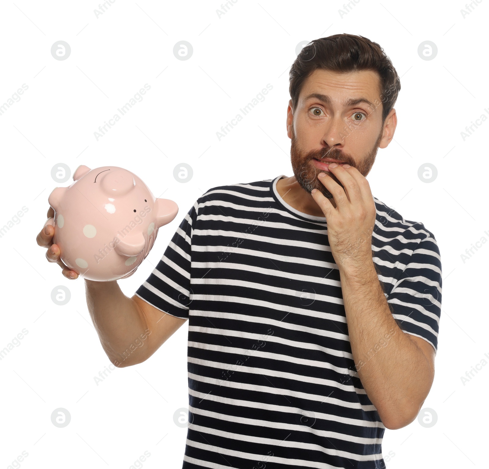 Photo of Man with ceramic piggy bank on white background