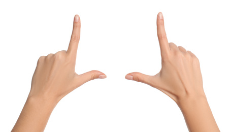 Woman making frame with hands on white background, closeup