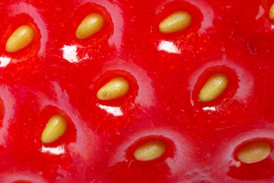 Texture of ripe strawberry as background, macro view. Fresh berry