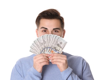 Young man with money on white background