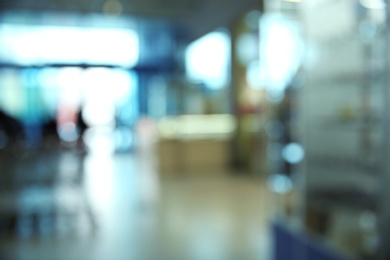 Blurred view of modern shopping mall interior