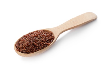 Wooden spoon with brown rice on white background