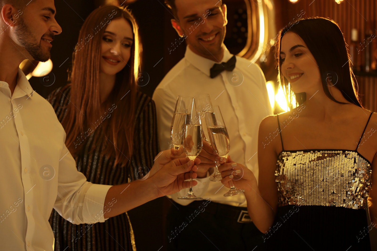 Photo of Young people celebrating New Year in club