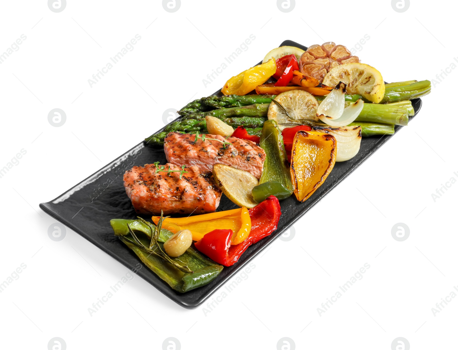 Photo of Tasty grilled salmon with lemon and vegetables on white background