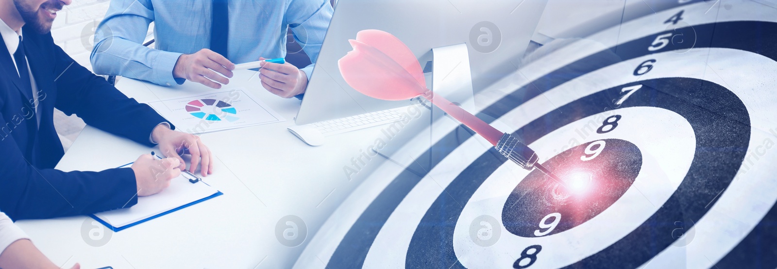 Image of People having business meeting and dart board with arrows. Double exposure