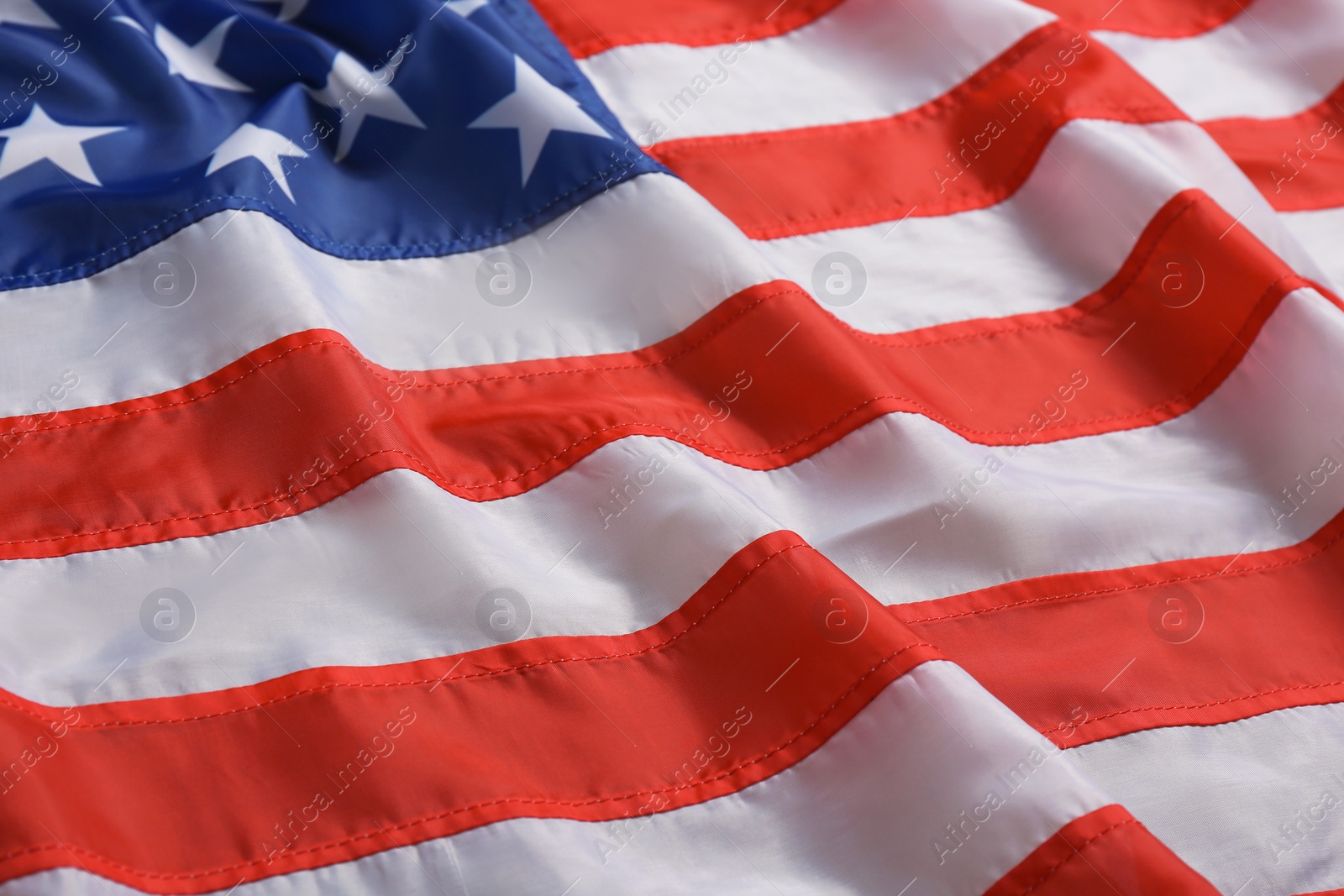 Photo of American flag as background, closeup. National symbol of USA