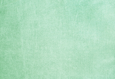 Image of Texture of delicate fabric as background. Image toned in mint color 