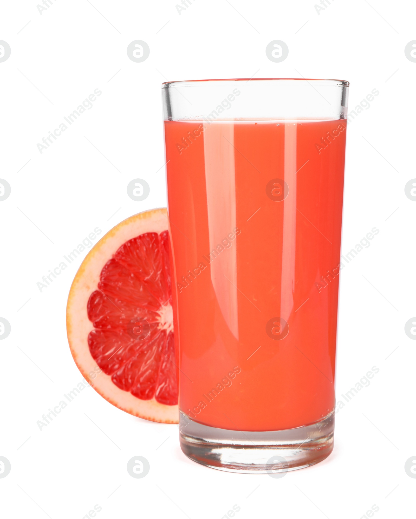 Photo of Tasty grapefruit juice in glass and half of fresh fruit isolated on white