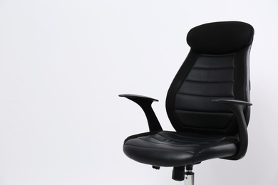 Comfortable office chair on white background, space for text