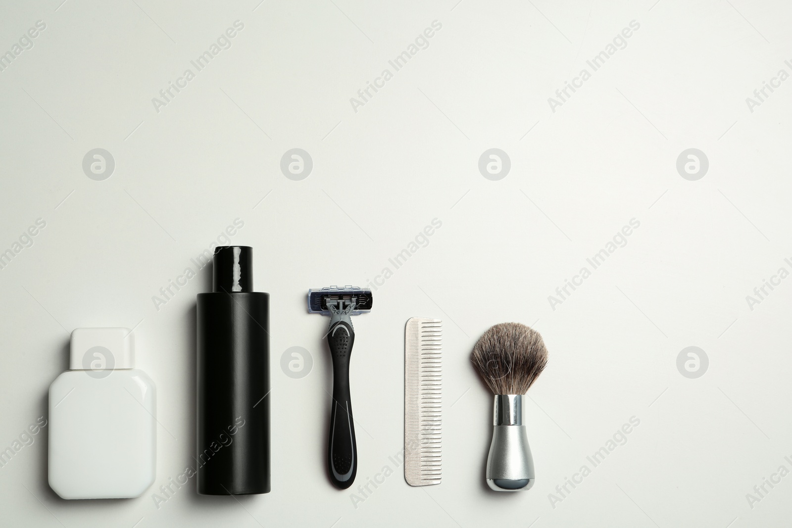 Photo of Flat lay composition with men's shaving accessories and space for text on white background