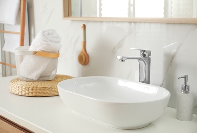 Stylish white sink in modern bathroom interior