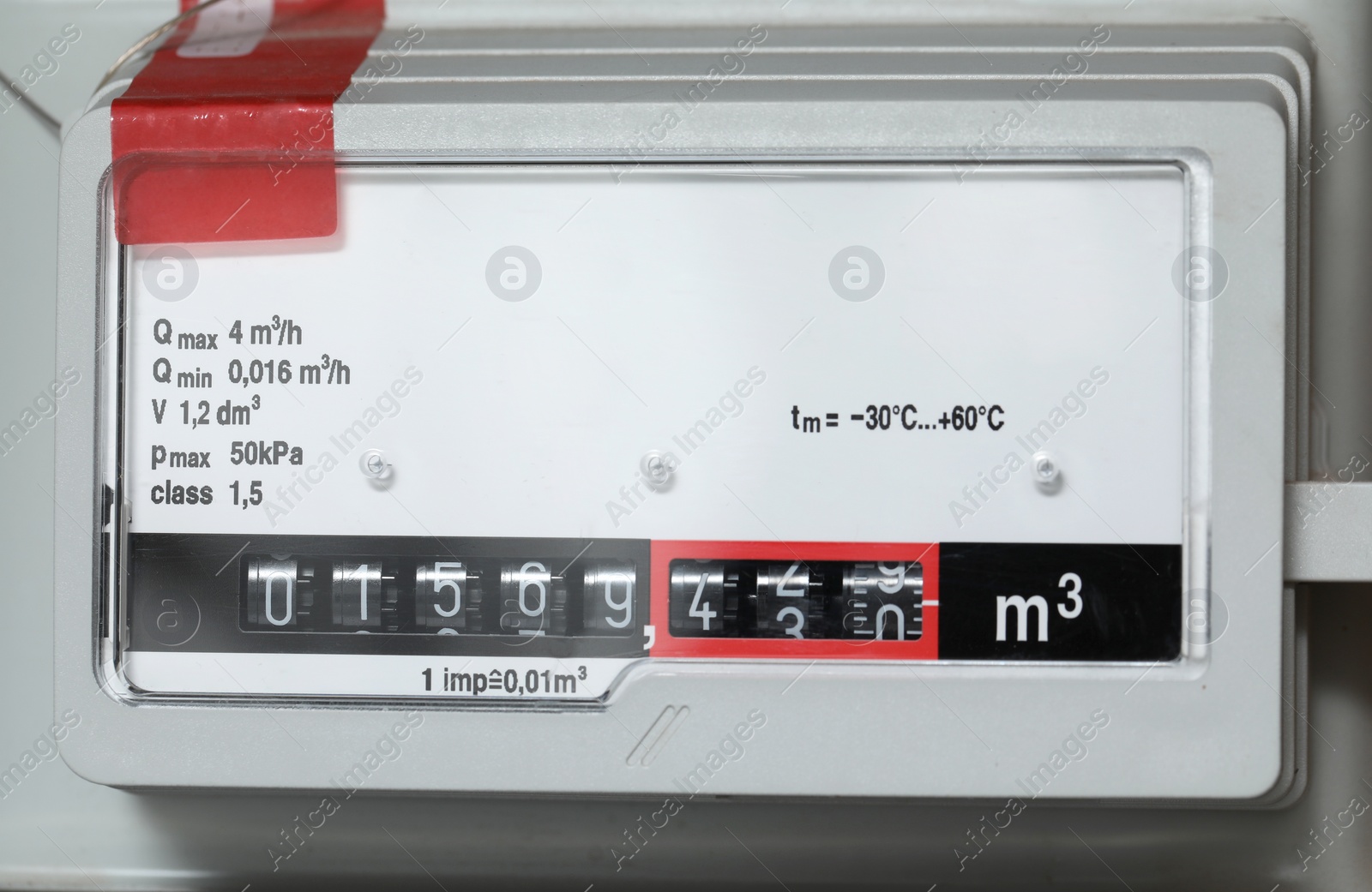 Photo of Electric meter as background, closeup. Gas measuring device