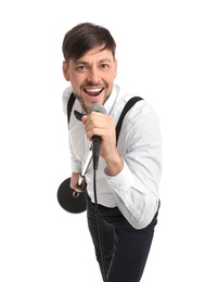 Handsome man in formal clothes singing with microphone on white background