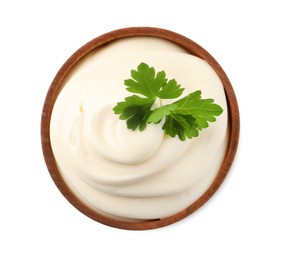 Photo of Bowl with delicious mayonnaise and parsley isolated on white, top view