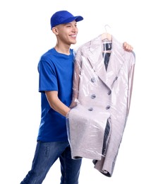 Dry-cleaning delivery. Happy courier holding coat in plastic bag on white background