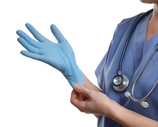 Doctor wearing light blue medical glove on white background, closeup