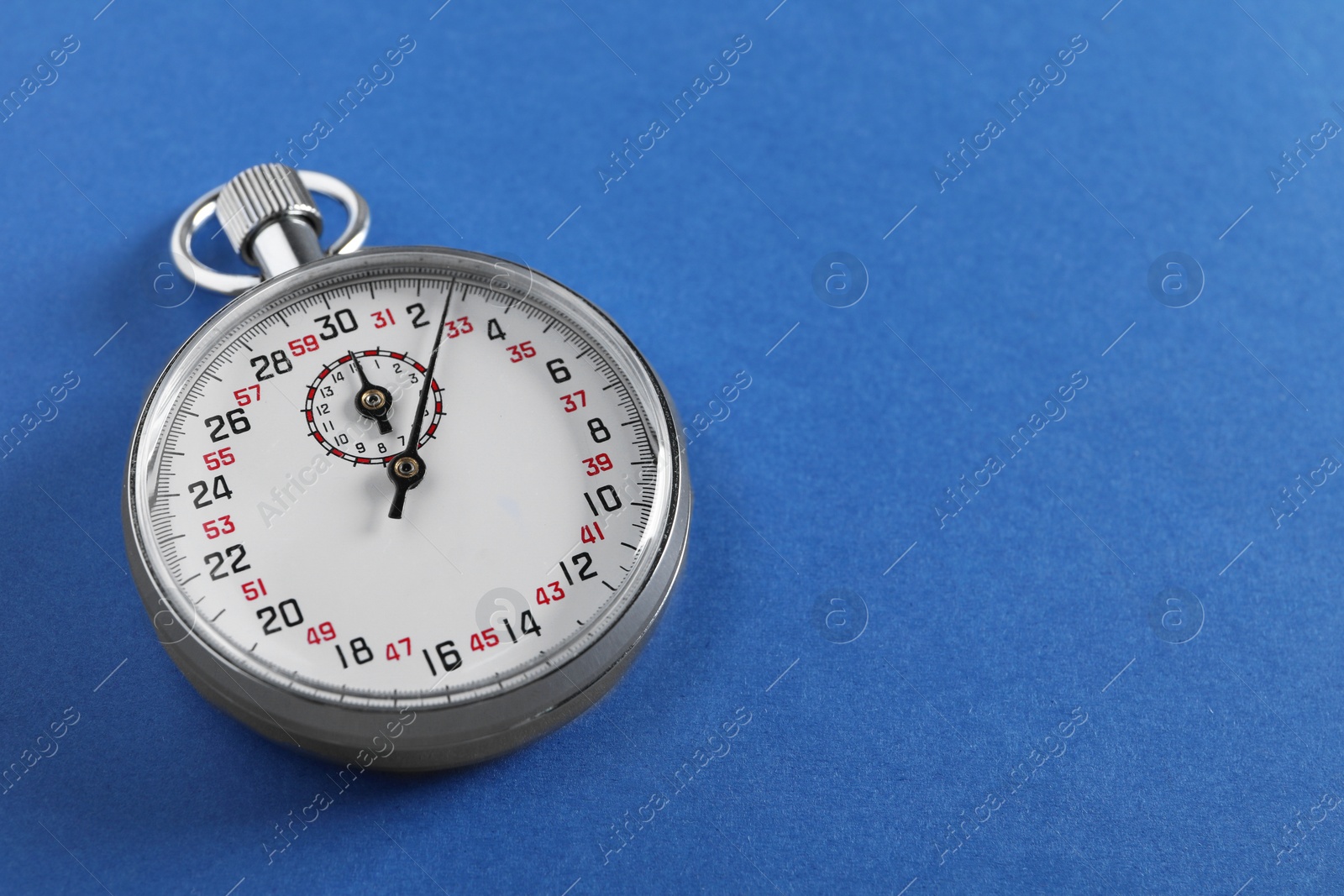 Photo of Vintage timer on blue background, space for text. Measuring tool