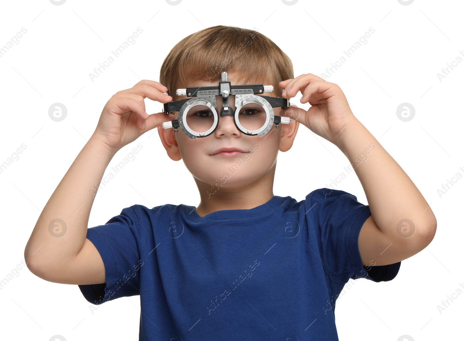 Photo of Vision testing. Little boy with trial frame on white background