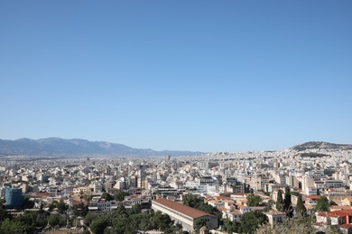 Photo of Picturesque view of cityscape with beautiful houses on sunny day